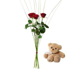 Tre röda rosor och en söt nalle. Skicka presenten med ett blommogram från Interflora på Alla Hjärtans Dag!